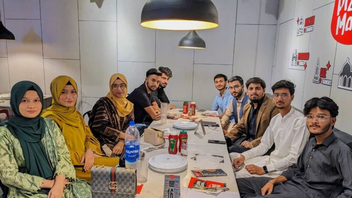 Saapx team members enjoying dinner together at the annual team dinner